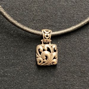 Silver scroll pendant